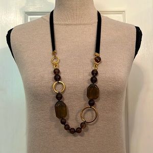 Cookie Lee gold necklace with black velvet ribbon and brown beads